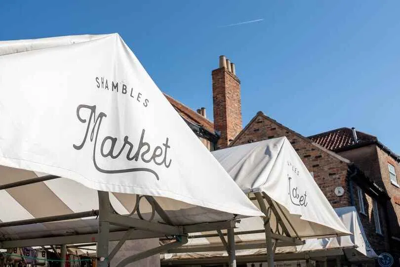 Awnings over market stalls at Shambles market in York